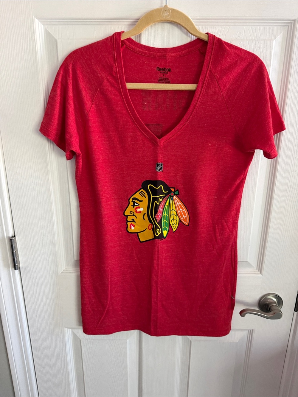 Reebok Women’s Red V-Neck Blackhawks Logo Tee